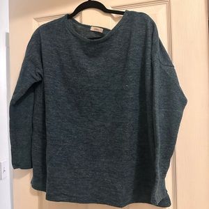 Greenish blue light sweatshirt. No size listed. Usually wear a S